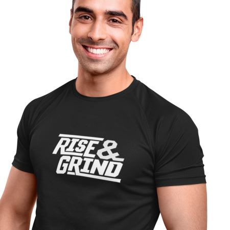 Fit Man in his 30s wearing a Black Tee with a design that says Rise and Grind printed on it.